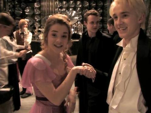 tom felton and emma watson 2011. tom holding watson hand
