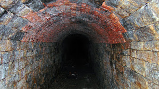 <img src="Hidden Tunnel , Park Bridge Ashton .Under  Lyne..jpeg" alt="urban photography, old buildings, railway relics">