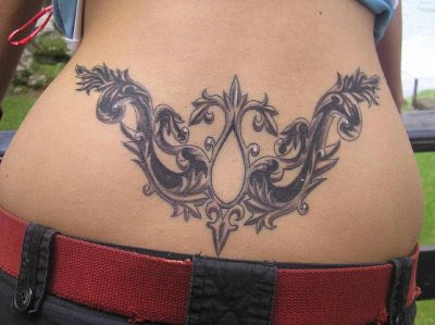 Girl Lower Back Tribal Tattoo