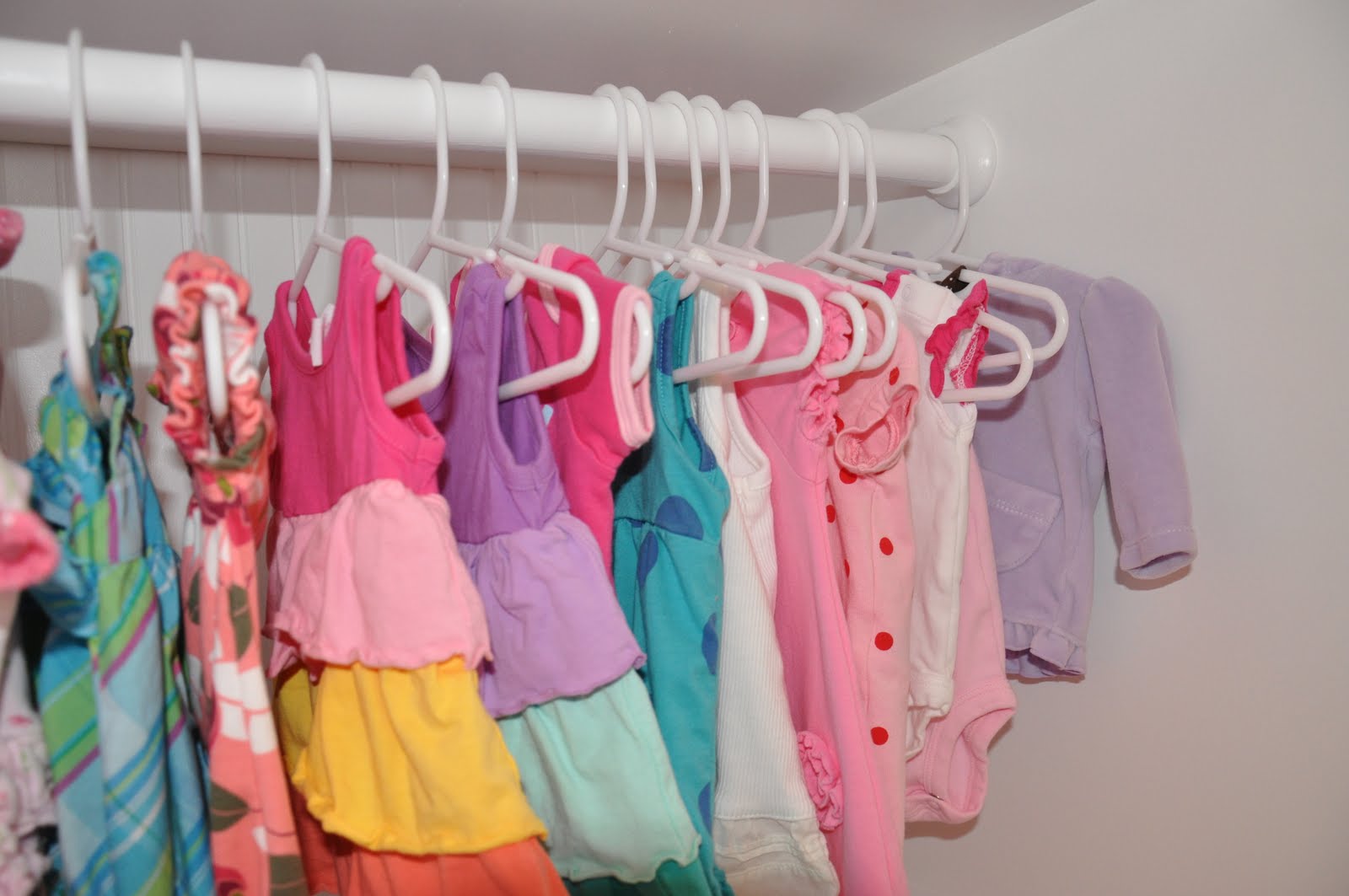  two seperate places to hang clothes - here are some newborn clothes