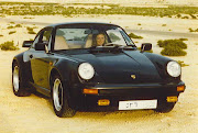 Julie our accounts girl in Torfiq Al Aali's Porsche 930 with pink leather . (meac torfiq )