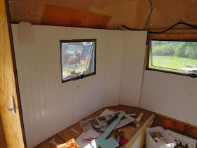 paneling inside a fiberglass trailer