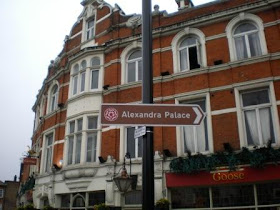 The Brown Sign pointing the way to Alexandra Palace. The sign is opposite Wood Green Tube Station