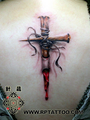 cross tattoo design on the back