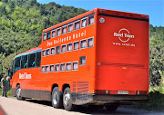 The Mercedes tour bus with guide is fitted out with passenger seats for .