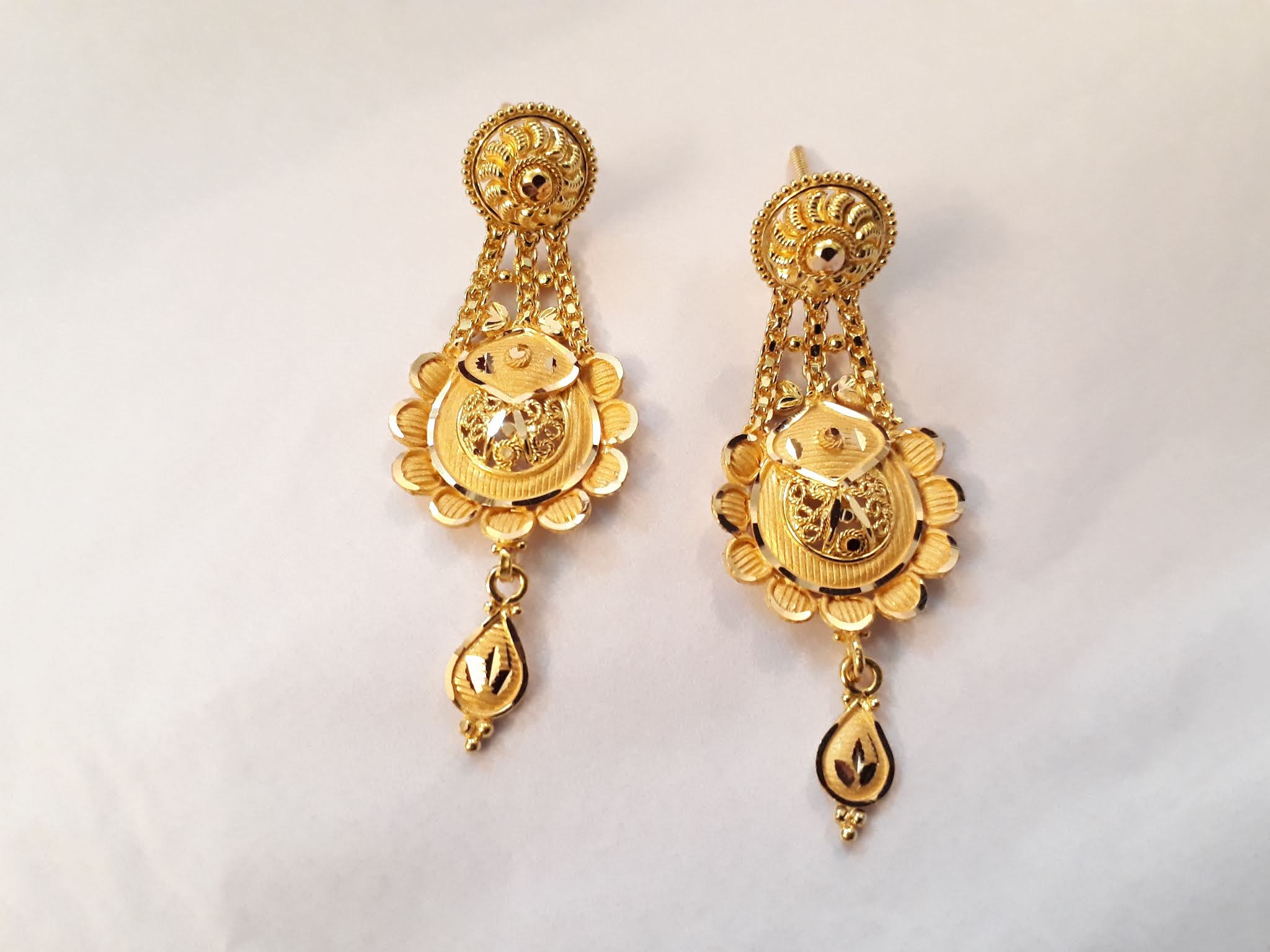 Gold Earrings designs,gold hoop earrings,gold drop long earrings,gold pinjada jhumka designs,gold chandbali earrings,gold Ear studs designs,Party wear earrings,Daily Wear gold earrings,fancy earrings designs,Latest new modles gold earrings,gold earrings huge designs,bridal gold earrings,gold studs designs,light weight gold earings designs,latest gold earings,daily wear gold stud designs,gold ear studs designs,Bridal Gold Long Earring Designs,latest ear studs