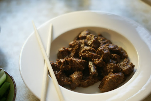 beef rendang with asian greens