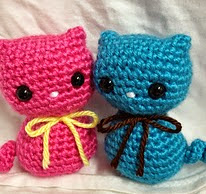 http://www.ravelry.com/patterns/library/crochet-colorful-kitty-cat-doll-toy