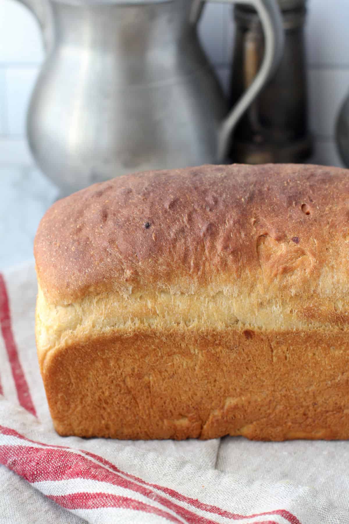 Yeasted Banana Sandwich Bread unsliced, side view.