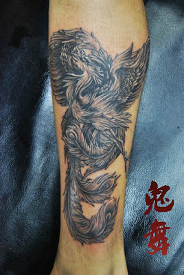 phoenix tattoo design on the leg