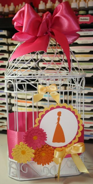 Here is the bird cage that I altered to hold cards from the shower