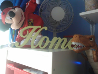 Home sign in Big Boy's room