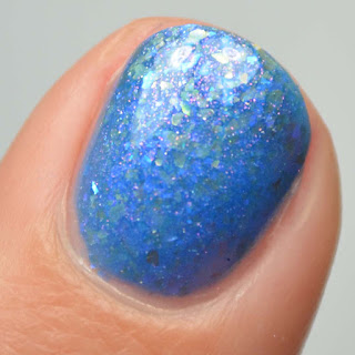 blue nail polish with flakies and shimmer