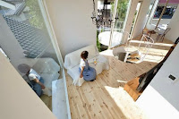 Tokyo Curved Wall House Design With A Bright White Facade And Lots of Glazing