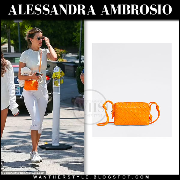 Alessandra Ambrosio in white leggings with orange crossbody bag in LA on  July 26 ~ I want her style - What celebrities wore and where to buy it.  Celebrity Style