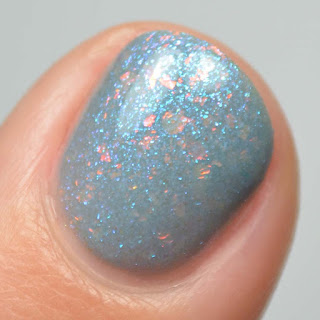blue grey nail polish with color shifting shimmer and flakies