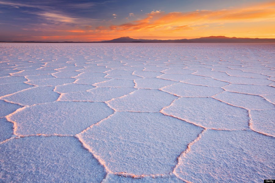 The Salar de Uyuni is the world's largest salt flat, an arid surface of minerals stretching for miles that turns into the one of the planet's largest mirrors during the rainy season.