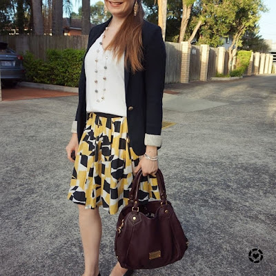 awayfromblue instagram | business casual autumn office printed pleated a-line skirt jersey blazer outfit