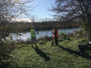 Volunteers plant native shrubs