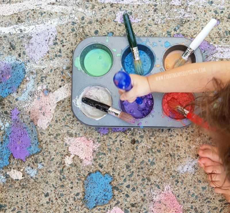 chalk painting on concrete driveway