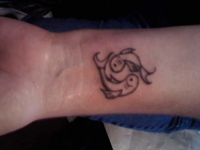 Ricca's left wrist my first freehand tat took 5 minutes to do tattook
