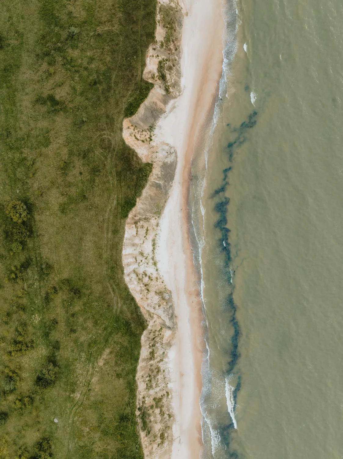 An ocean and land