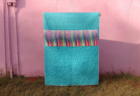 Texture quilt with 3-D twisted strips