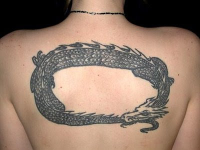 Tell me what you're thinking about design of this Tribal dragon tattoo