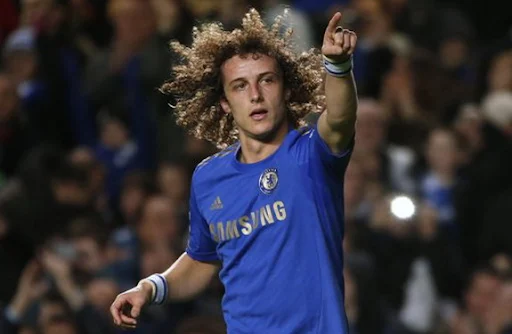 Chelsea player David Luiz celebrates after scoring a goal against Aston Villa