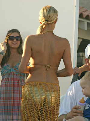 Paris Hilton Pictures GOLDEN BIKINI OUTFIT from  Malibu Beach House