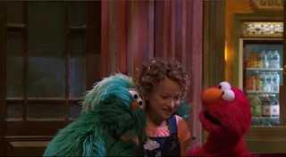 Charlie thanks Elmo and Rosita for their friendship. Sesame Street Episode 5013, New Neighbor on Sesame Street, Season 50.