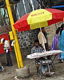 newspaper and magazine vendor on the street