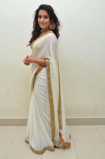 Rashmi gautham looking hot in white sleeveless saree