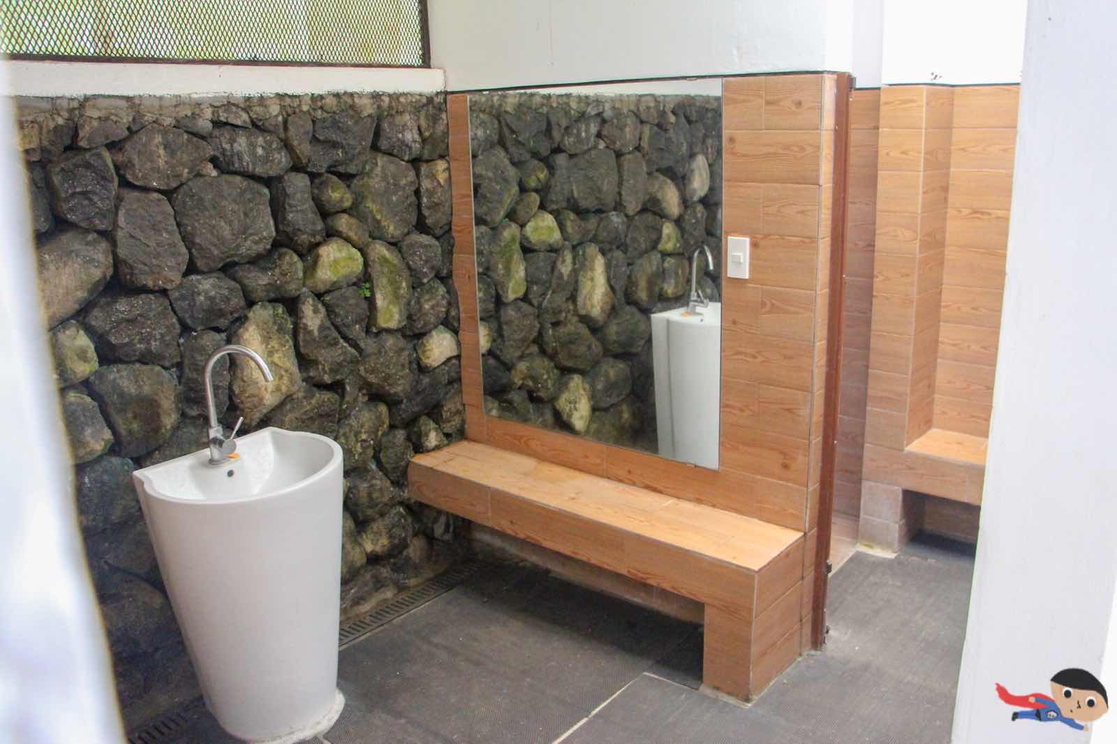 Shower area and toilet in the pool side of Jamaica Peak Resort