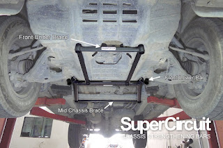 SUPERCIRCUIT Chassis Bars installed to the undercarriage of the Hilux REVO