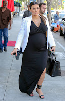 Kim Kardashian looks gorgeous in a tight black dress