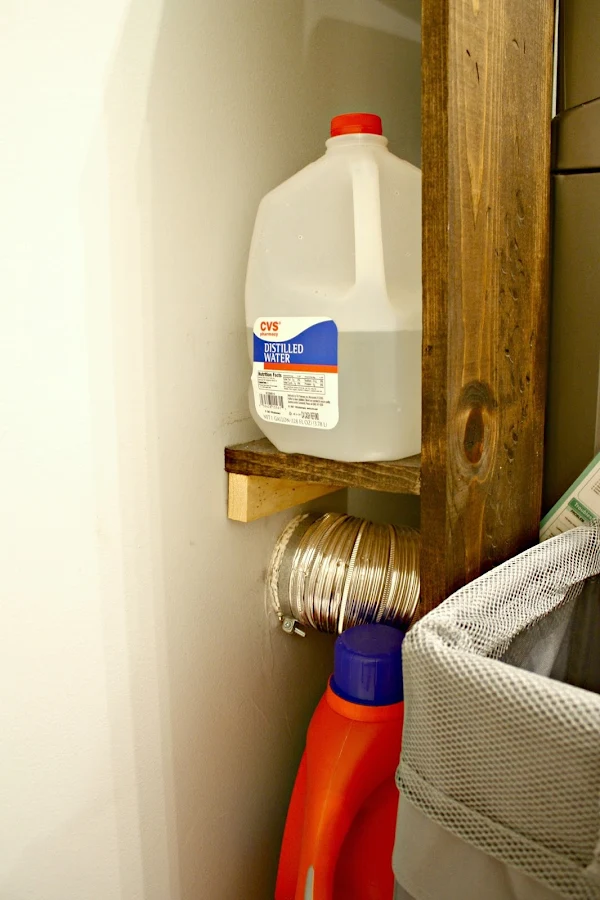 DIY shelf behind washer and dryer