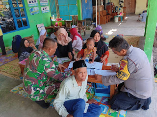 BHABINKANTIBMAS KALURAHAN TRIHARJO HADIRI MONEV POSYANDU TERPADU KASIH IBU