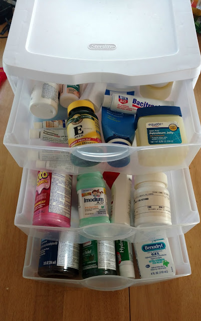 Use drawers, containers and labels to organize your medicine cabinet.