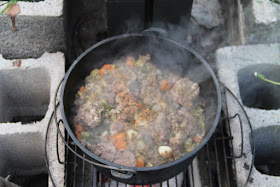 Hobo cooking in dutch oven