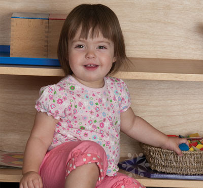 namc montessori developing independence in toddlers girl with low shelf limited choice