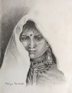 Pencil portrait of an Indian woman's face using graphite pencil. By Manju Panchal