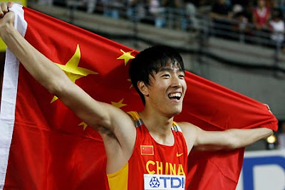 Liu Xiang becomes first Chinese man to win world athletics title
