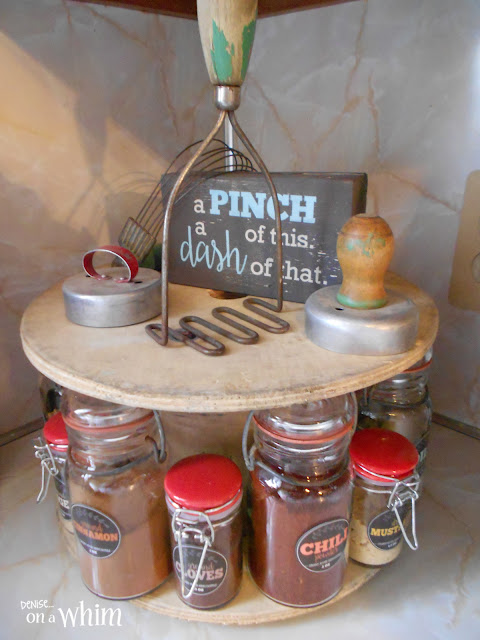 Mason Jar Spice Rack on an Old Spool with Vintage Kitchen Utensils and a Sign | Denise on a Whim