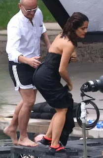 Salma Hayek hollywood actress in swim suite bending down