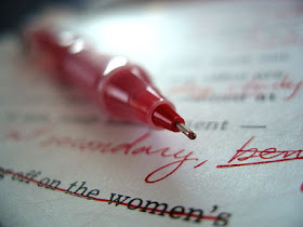 Editing Paper With Red Pen