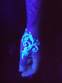 Ultra violet tattoo on hand