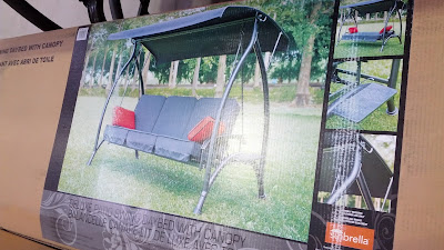 Sunbrella Patio Swing Daybed with Canopy for relaxing outside