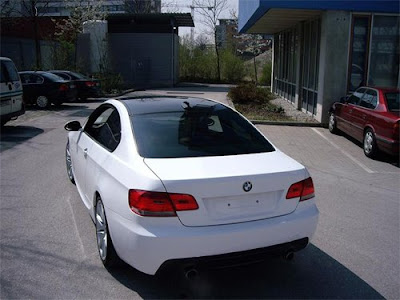 A Black BMW has been taped to White