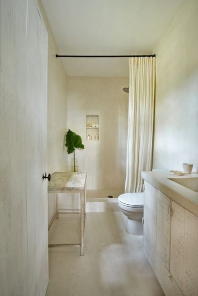 Gorgeous and calm monochromatic bathroom with minimal natural decor - found on Hello Lovely Studio